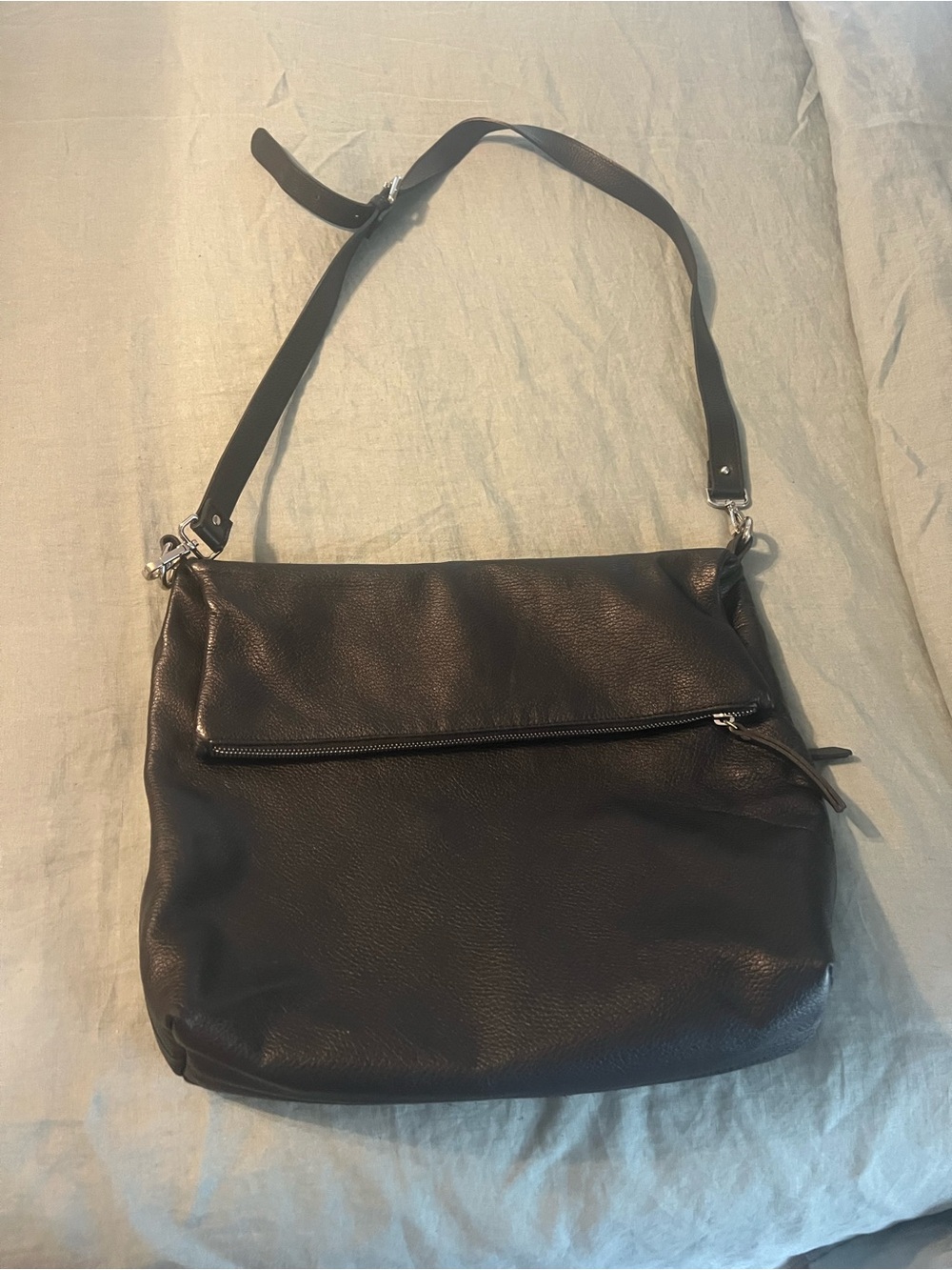 Black leather shoulder bag with various convertible zippered pockets- NWOT